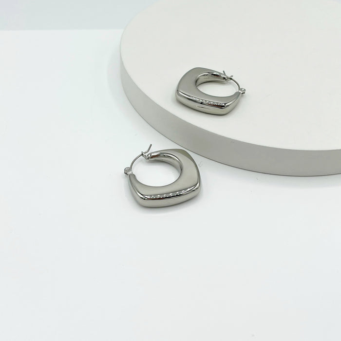 Medium sized stainless steel silver hoop,earrings with geometric shape