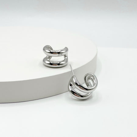 Silver double hoop earrings with curved edges 