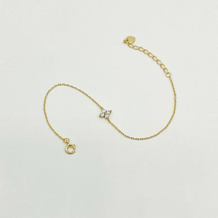 18k gold plated sterling silver dainty bracelet with small floral clear stones and clasp fastening