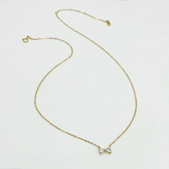 14k gold plated sterling silver minimal necklace with small cubic zirconia bow