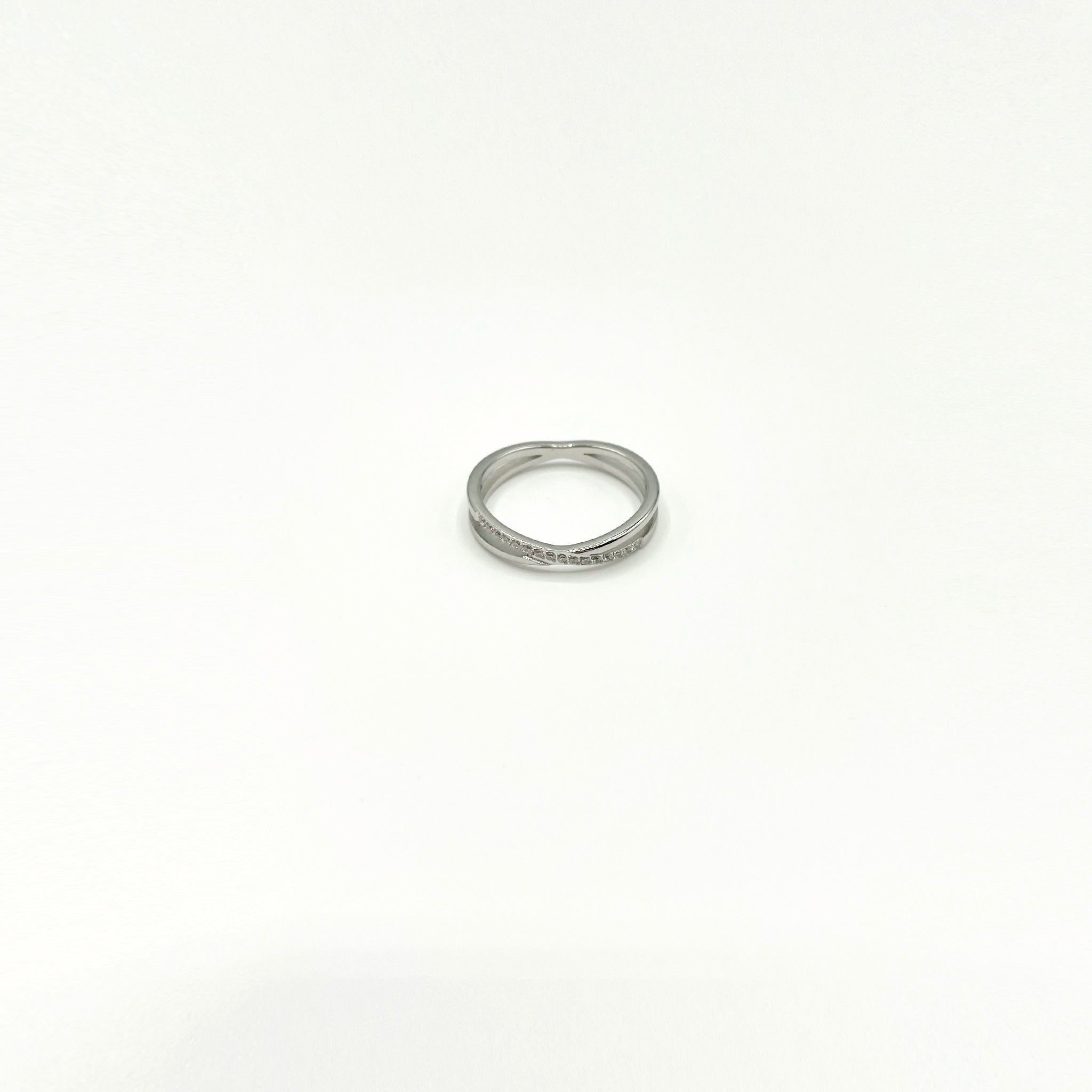 Minimal silver crossed band ring with rhinestones 