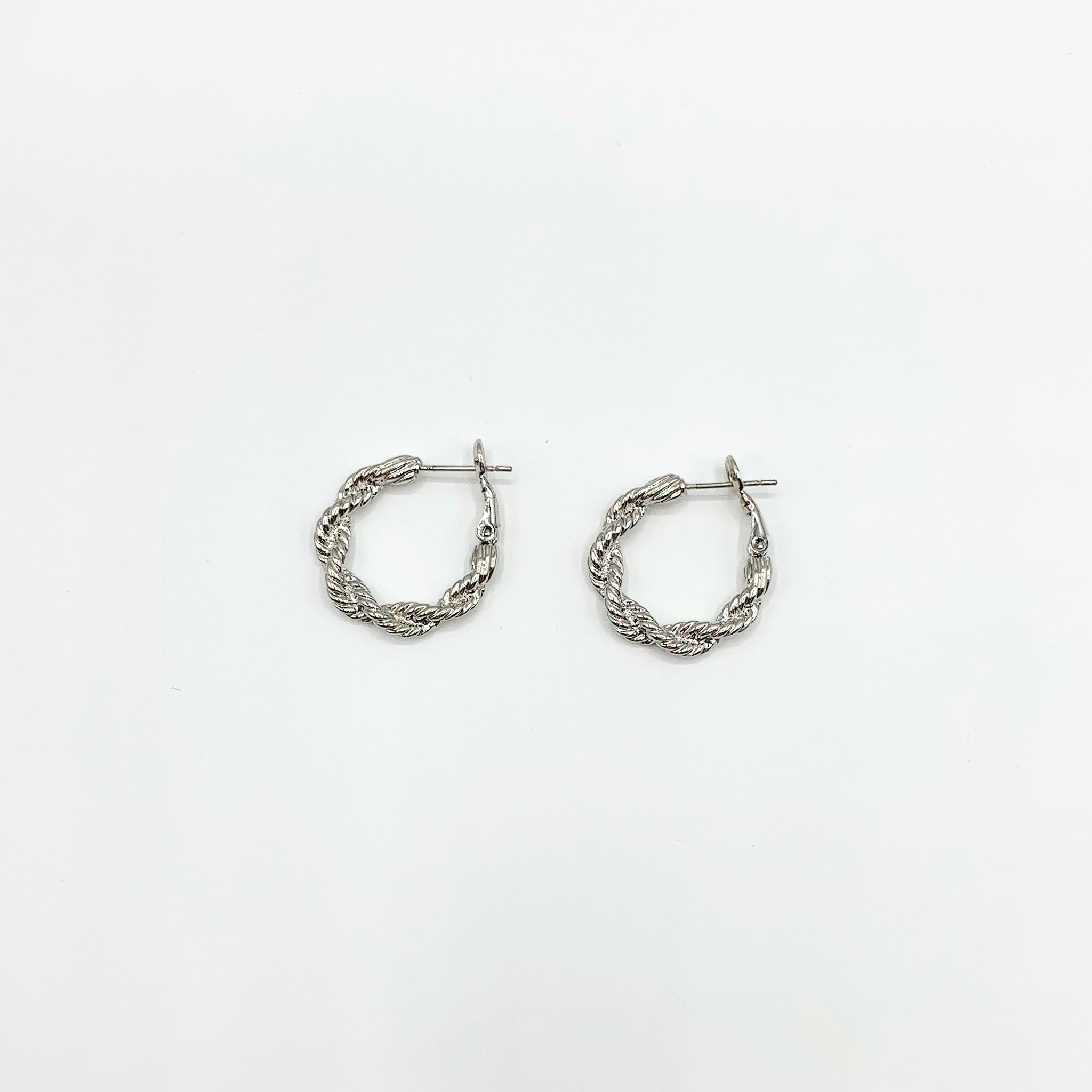 Silver textured twisted hoop earrings 