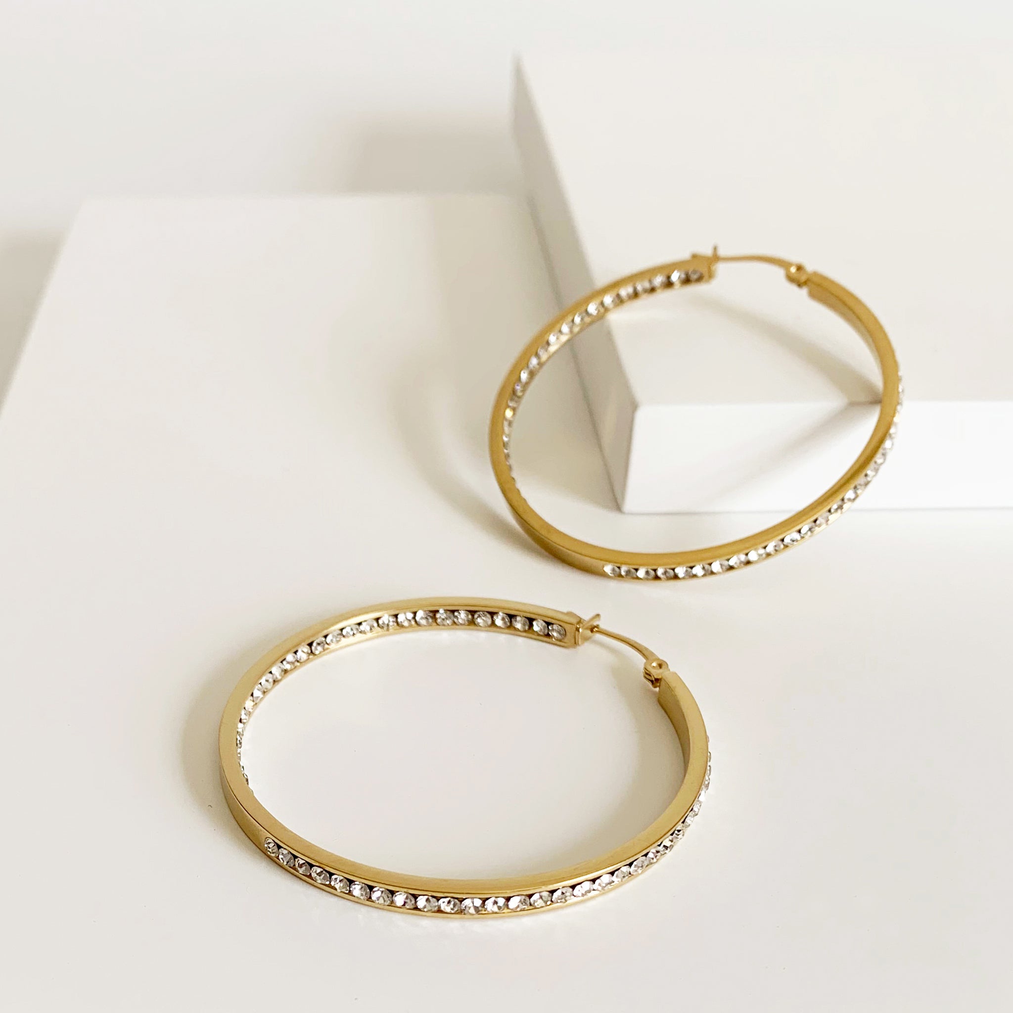 Large gold plated hoop earrings with rhinestones 