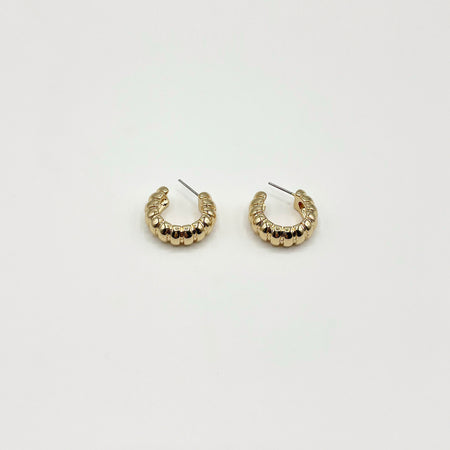 Chunky gold hoop earrings with rib texture 