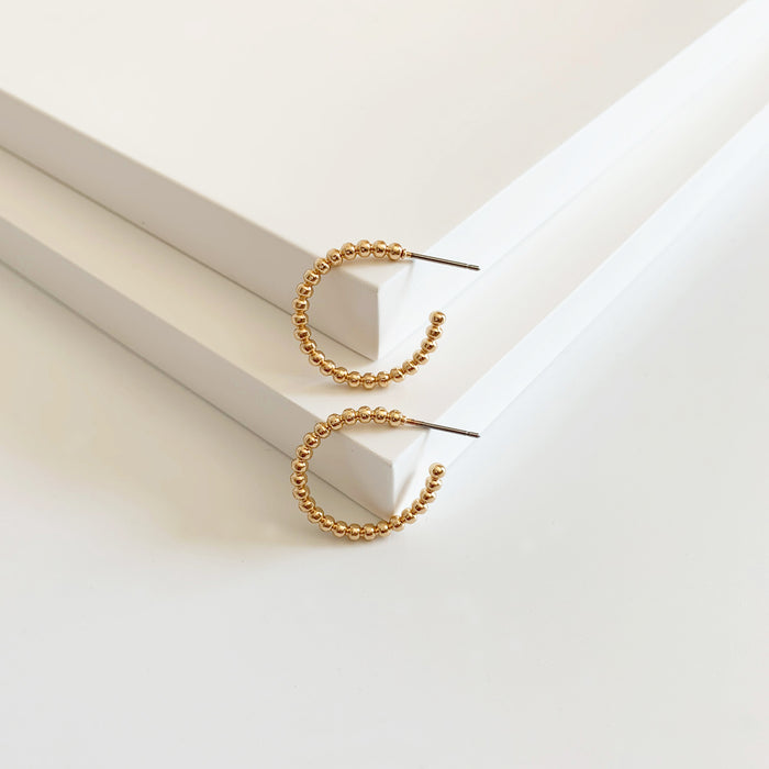 Fleur gold textured hoop earrings