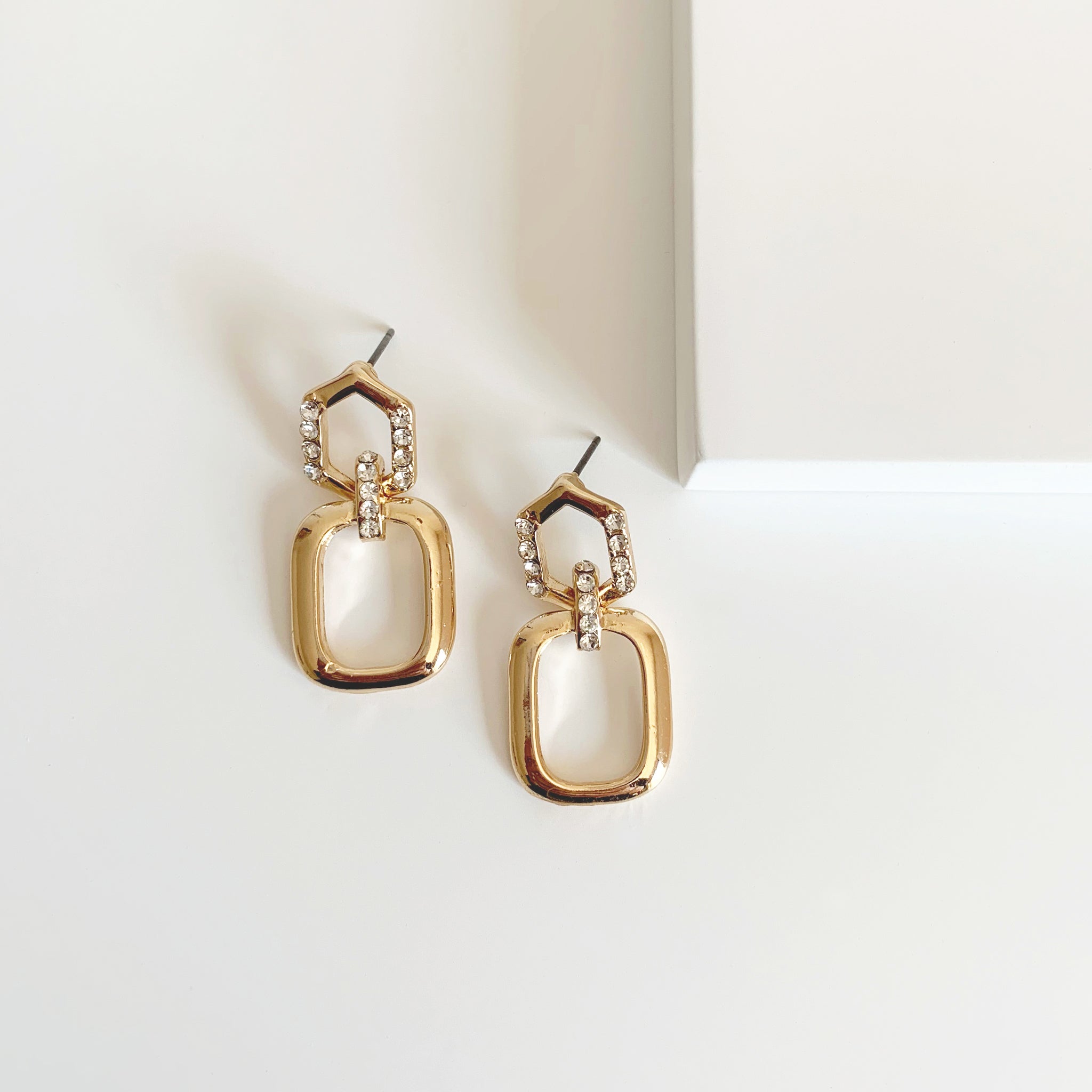 Gold geometric drop earrings with rhinestones 