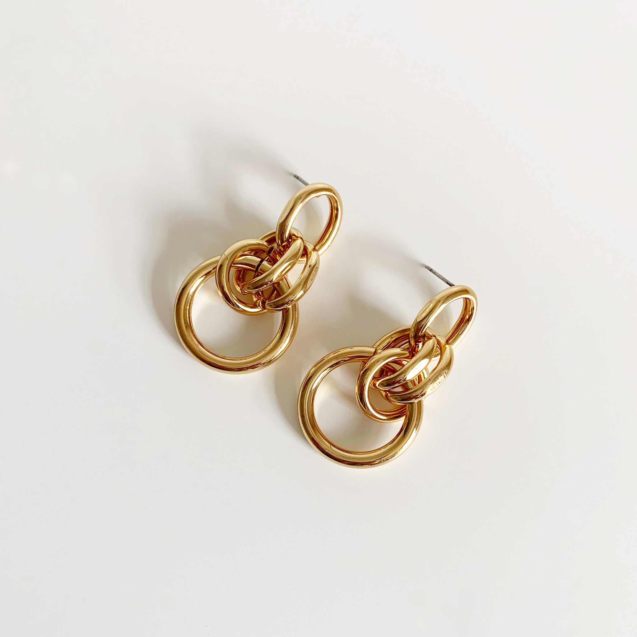 Gold multi circle link drop earrings 