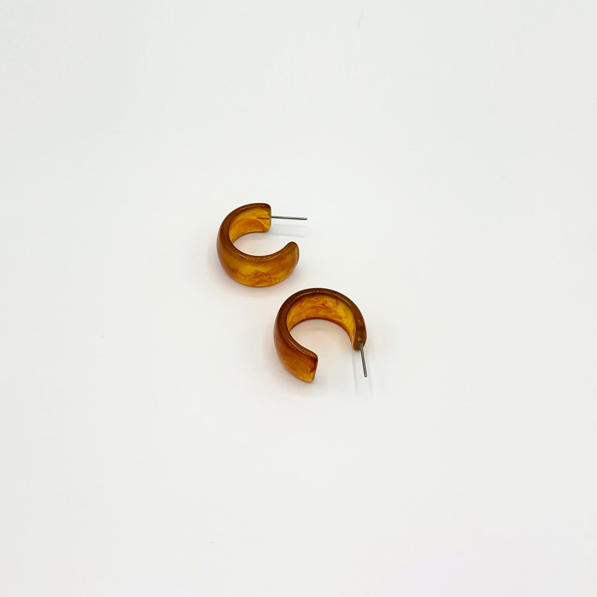 Small chunky tan colour resin hoop earrings 