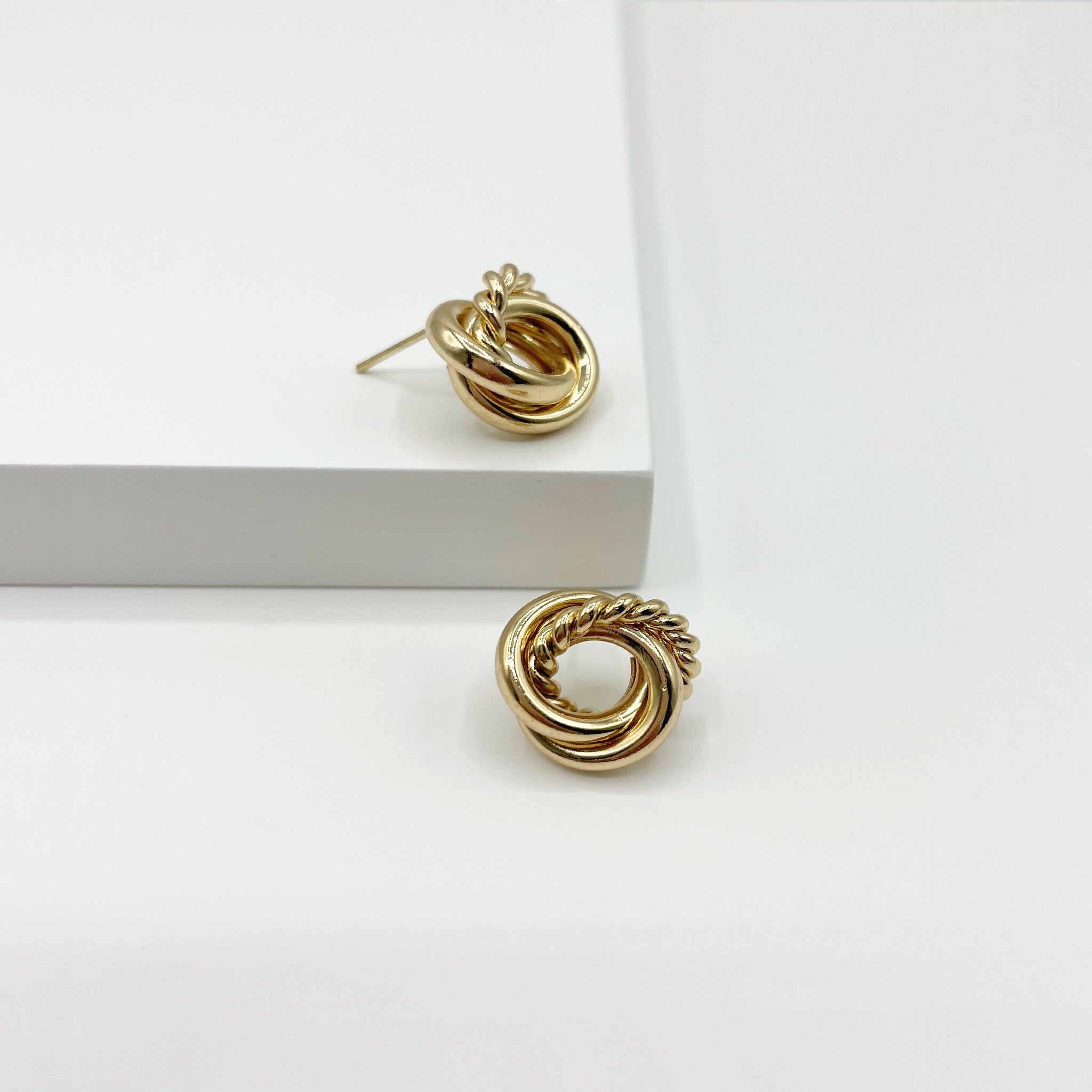 Gold twisted knot stud earrings 