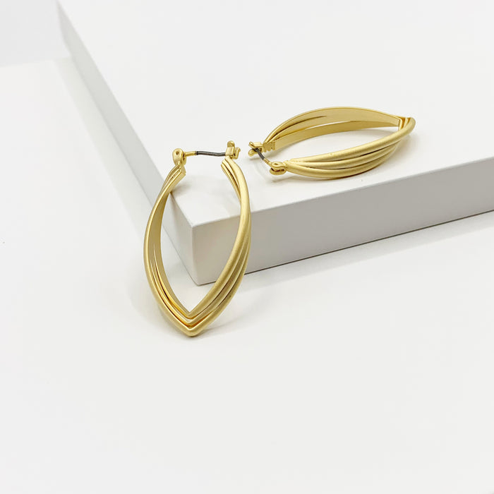 Serena 14k gold plated twisted oval hoop earrings